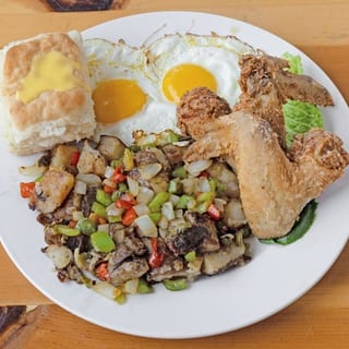 2 eggs, 2  jumbo wings, a biscuit, and hash or country potatoes.