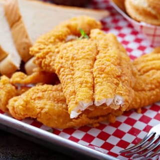 Crispy breaded 1/2lb of catfish strips, seasoned with a blend of herbs and spices