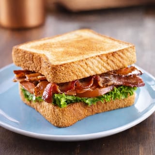 BLT with egg on toasted bread, choice of hash or country potatoes