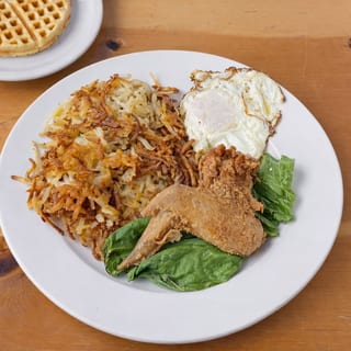 Waffle 1 egg, 1 jumbo wing, and hash, country potatoes or grits.